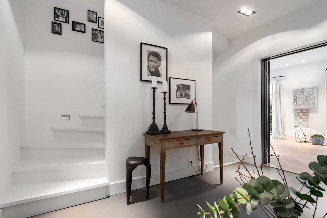 A clean and welcoming entryway of a modern home, illustrating an elevated guest experience strategy for a short-term rental.