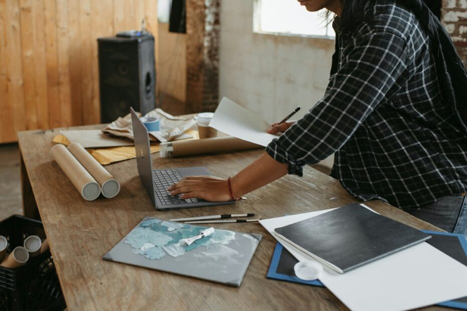 Close-up of an architect's hands meticulously drawing the blueprints for a modern building, symbolizing the strategic plan...